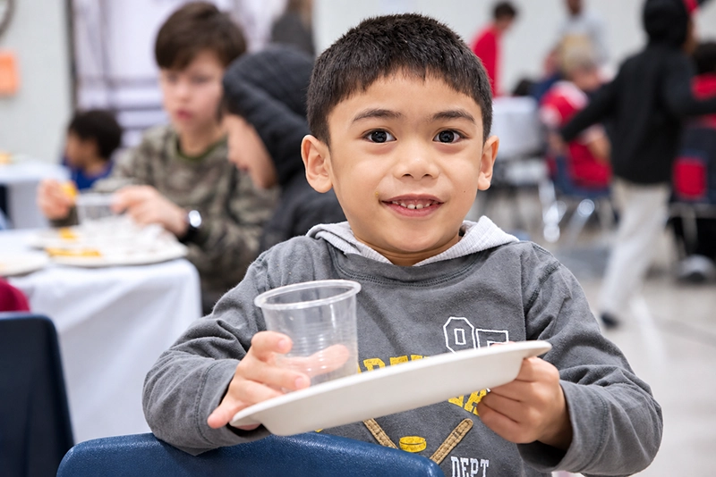 Boy at school breakfast nutrition program