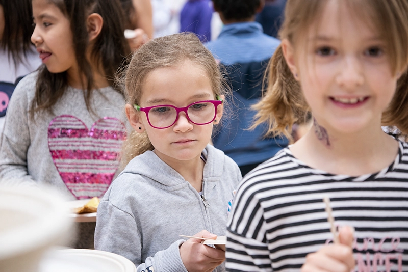 Young girls in line for school breakfast program